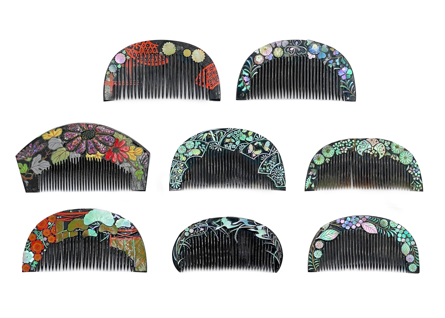 Eight Japanese black lacquer combs