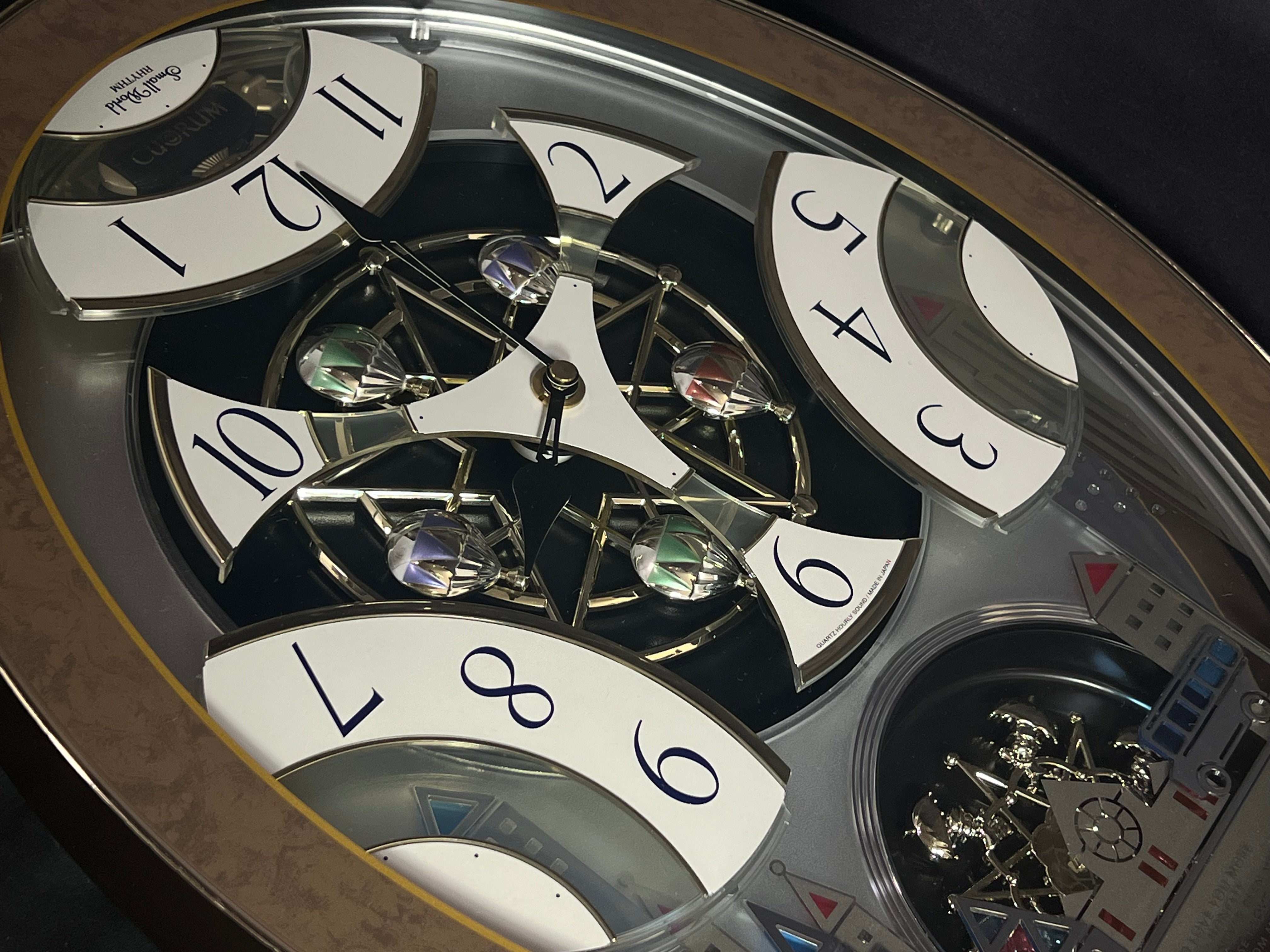Rhythm “Tri-Cracker” Magic Motion Musical Wall Clock with Moving Dial and Balloons