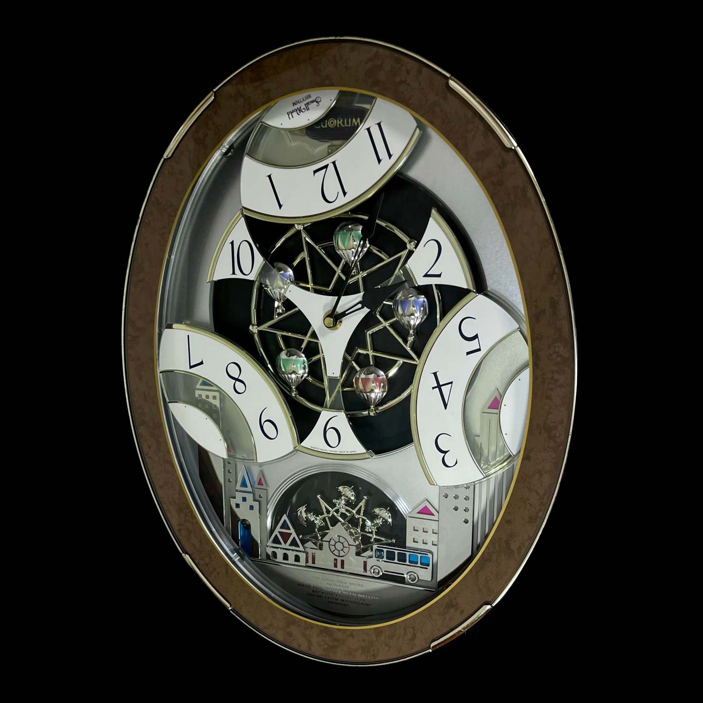 Rhythm “Tri-Cracker” Magic Motion Musical Wall Clock with Moving Dial and Balloons