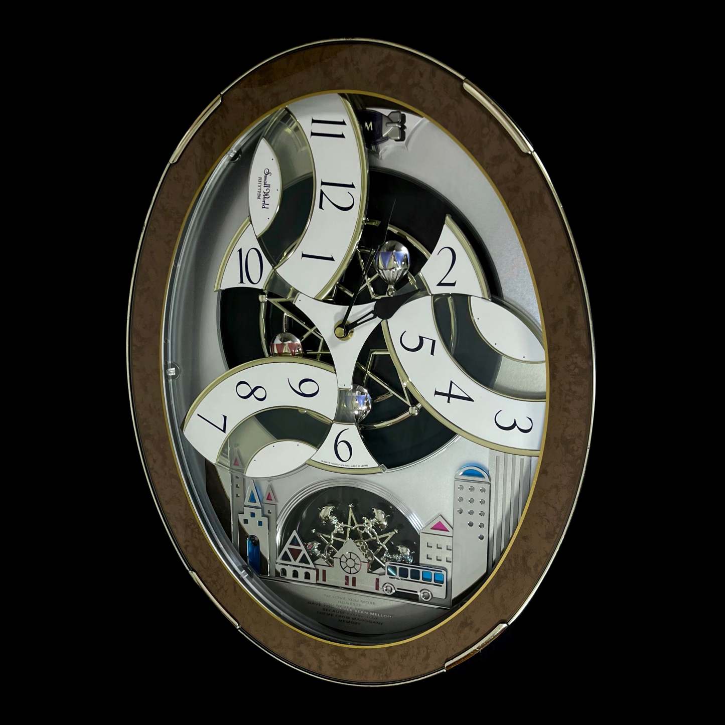 Rhythm “Tri-Cracker” Magic Motion Musical Wall Clock with Moving Dial and Balloons
