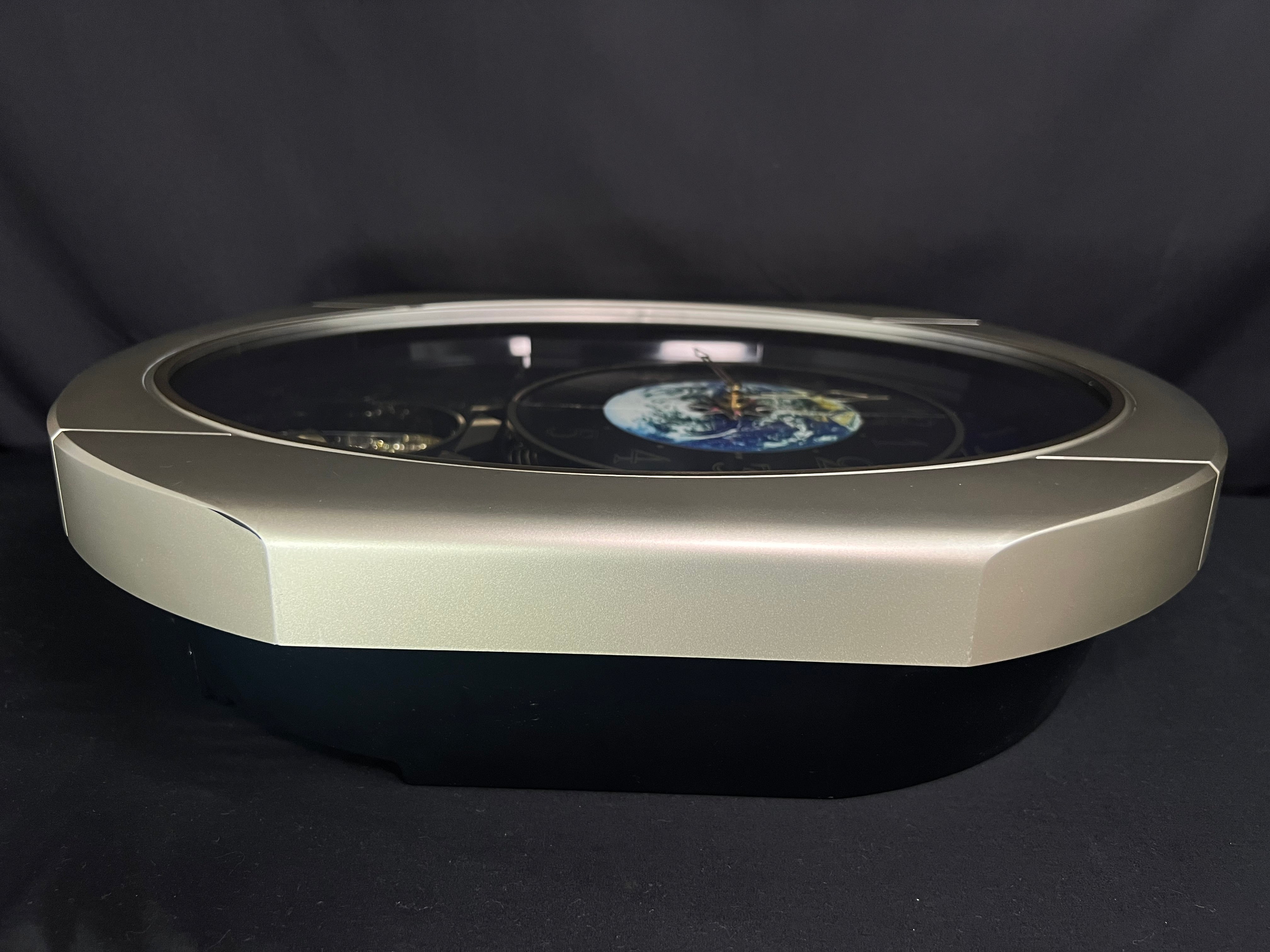 Moving Earth Dial Magic Motion Musical Wall Clock with Popular Melodies