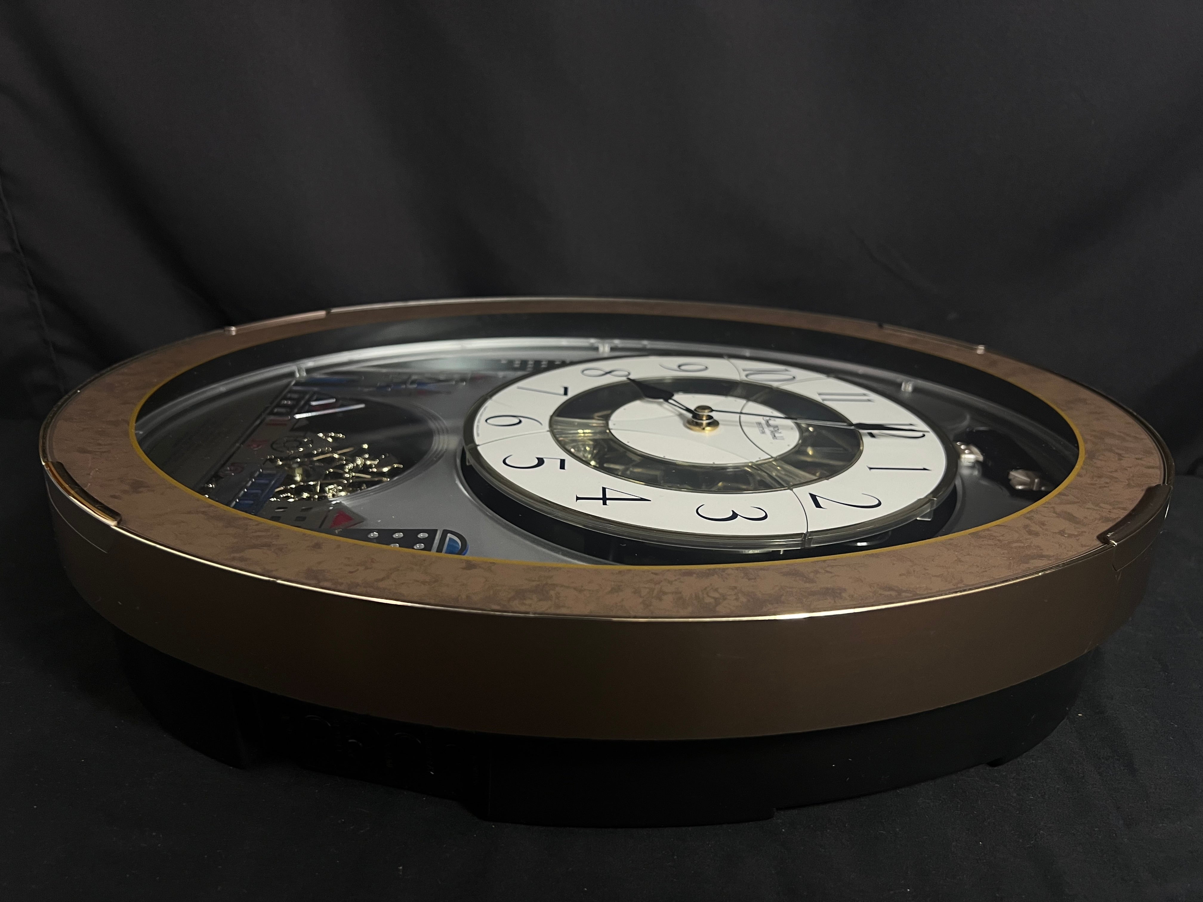 Rhythm “Tri-Cracker” Magic Motion Musical Wall Clock with Moving Dial and Balloons