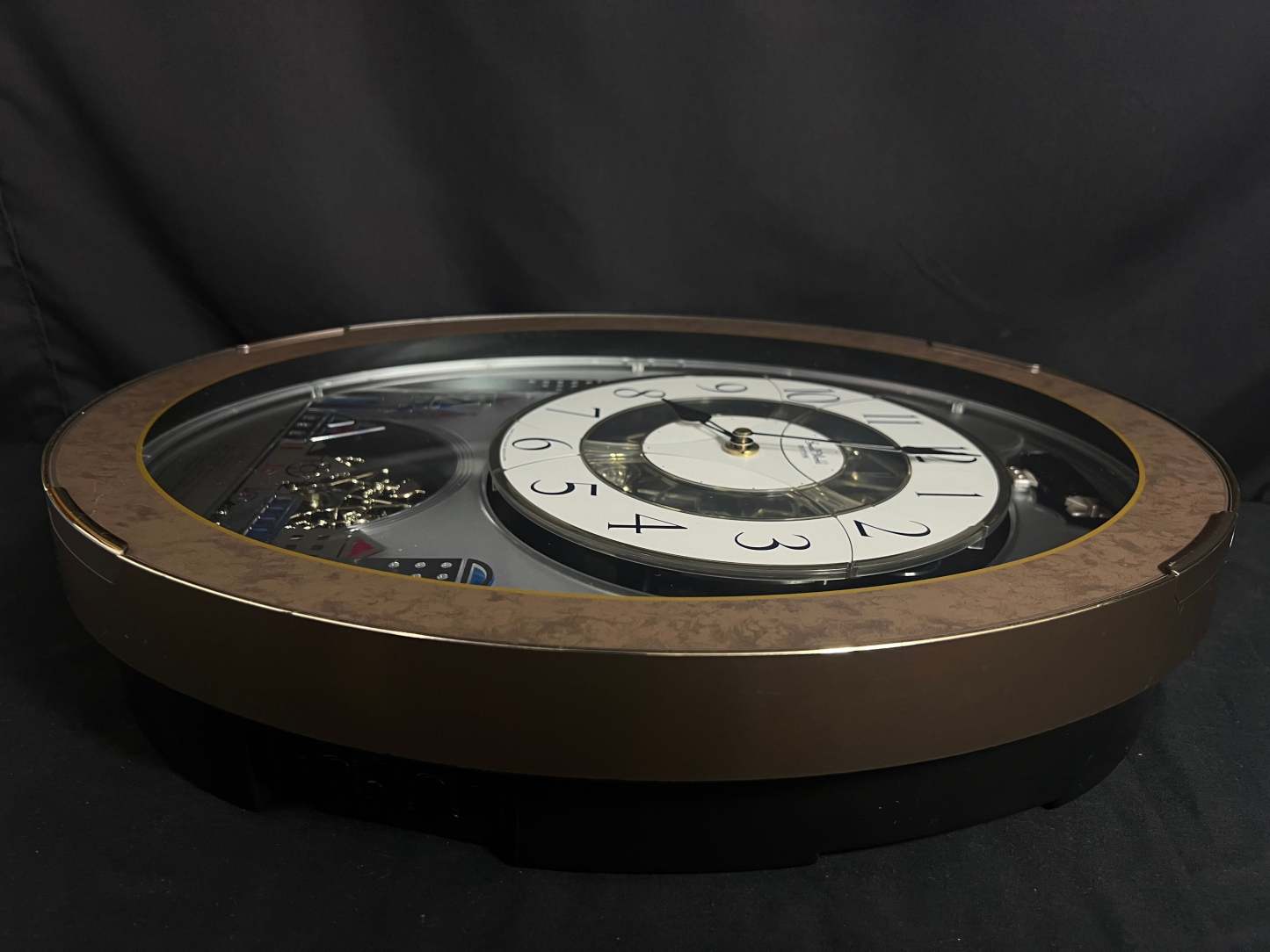 Rhythm “Tri-Cracker” Magic Motion Musical Wall Clock with Moving Dial and Balloons
