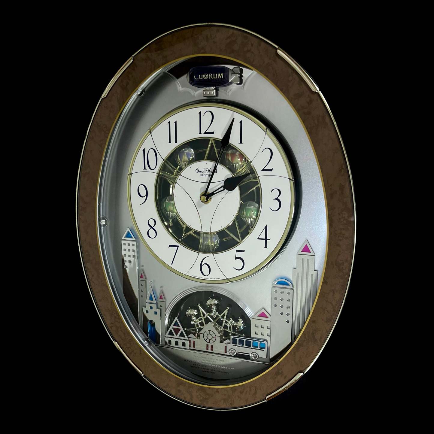 Rhythm “Tri-Cracker” Magic Motion Musical Wall Clock with Moving Dial and Balloons