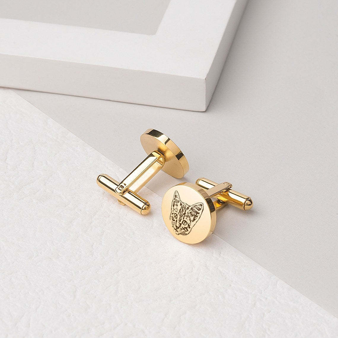 Elevate Your Style with a Touch of Whimsy - Gold-Tone Cat Cufflink. #CatCufflink #GoldToneAccessory #MensWithStyle