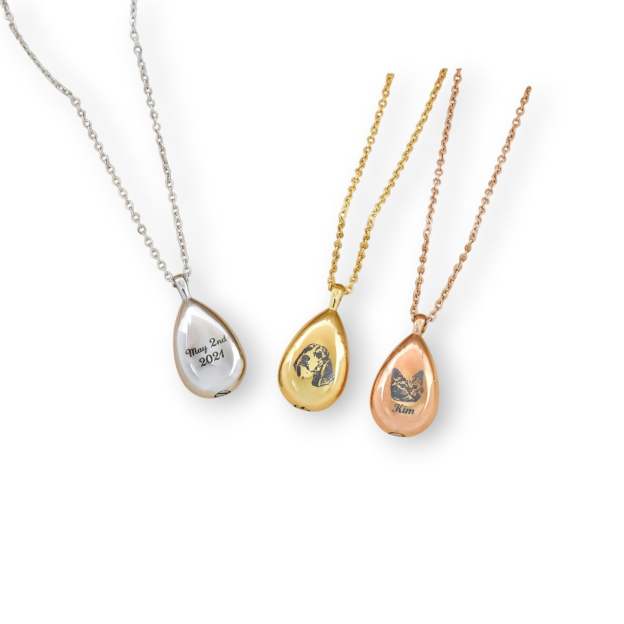 Memorialize Your Beloved Pet - Custom Engraved Pet Ashes Teardrop Necklace. #PetMemorialNecklace #CustomPetJewelry #AshesPendant