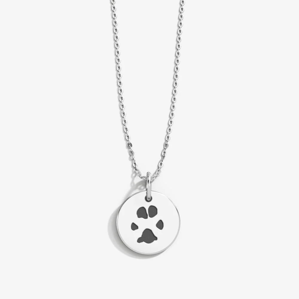 Show Your Love with a Silver Paw Print Pendant - Perfect for Pet Lovers. #SilverPendant #PawPrintJewelry #PetLoversGift