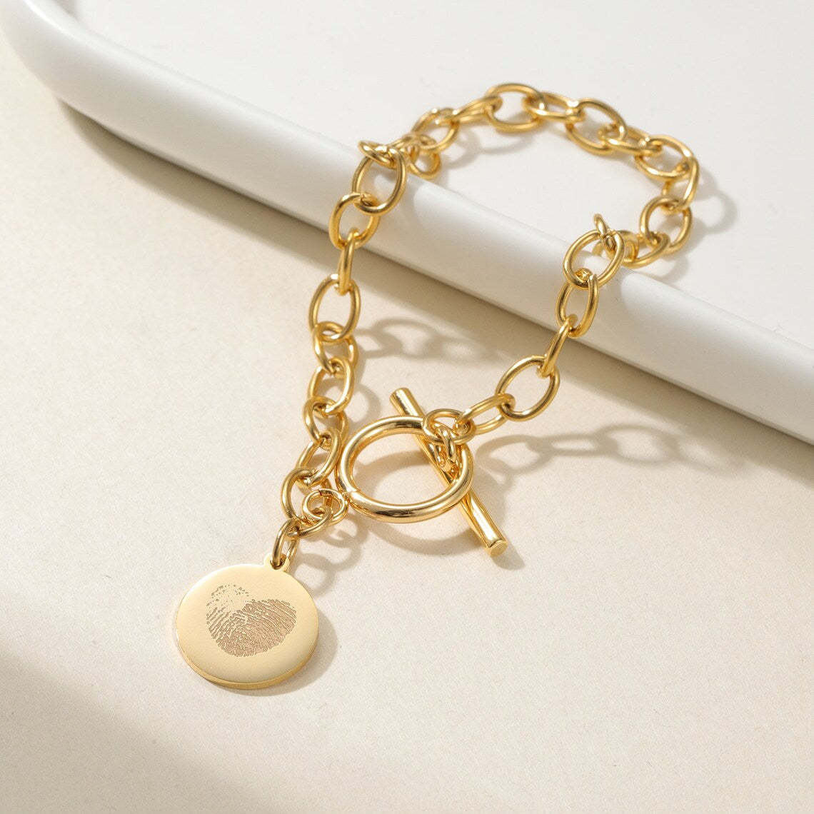 Cherish Life's Moments - Gold-Tone Fingerprint Bracelet, a Personal Touch. #FingerprintBracelet #GoldJewelry #PersonalizedGift