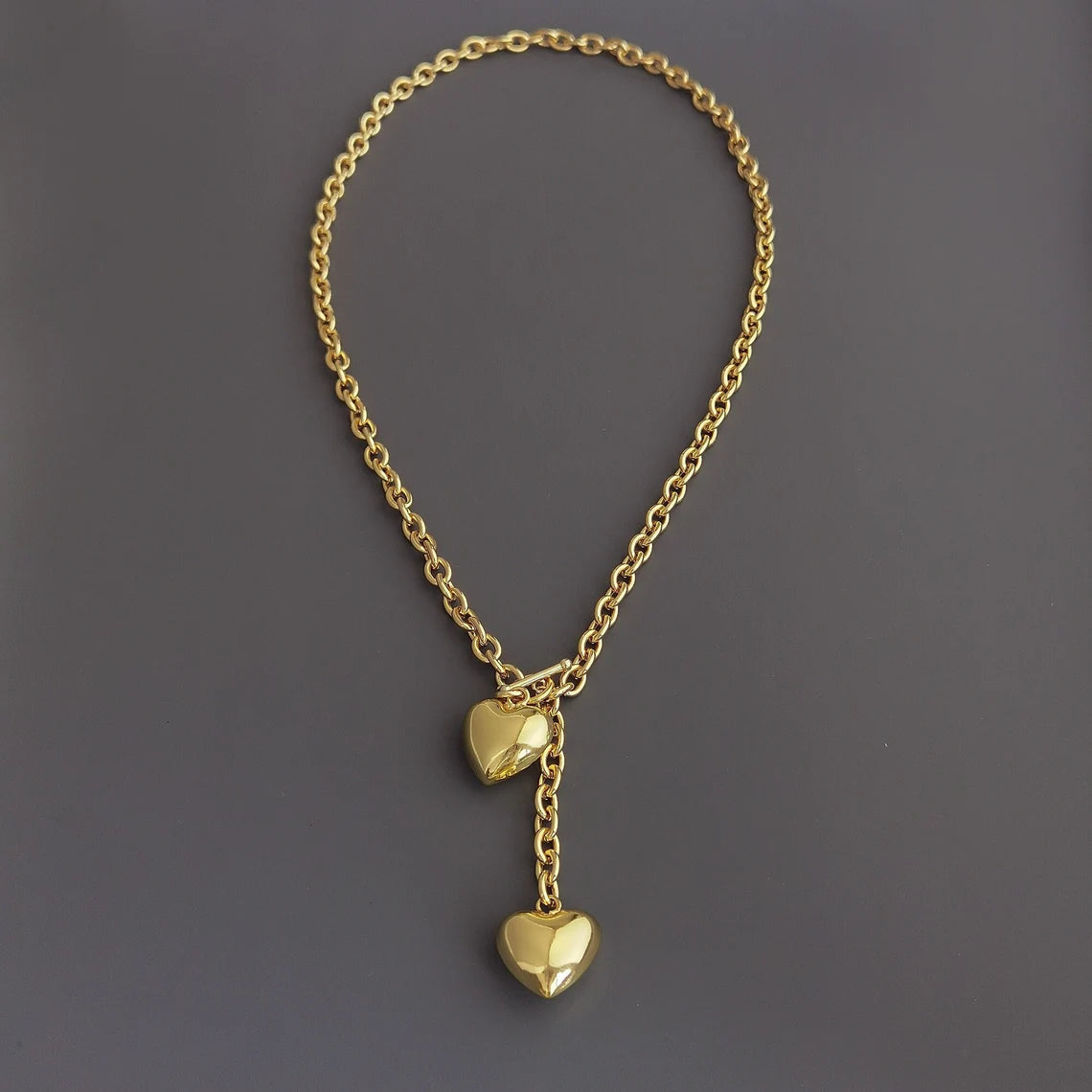 Elevate Your Style with a Gold-Tone Heart Pendant Necklace - A Symbol of Love and Elegance. #GoldHeartNecklace #PendantNecklace #LoveJewelry