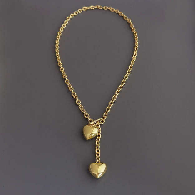 Elevate Your Style with a Gold-Tone Heart Pendant Necklace - A Symbol of Love and Elegance. #GoldHeartNecklace #PendantNecklace #LoveJewelry