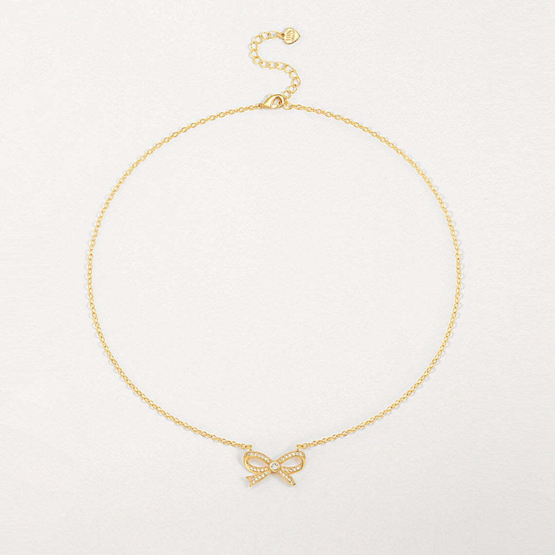 Elegant Gold Bow Pendant Necklace - Exquisitely Crafted in 14K and 18K Gold Plated & Solid