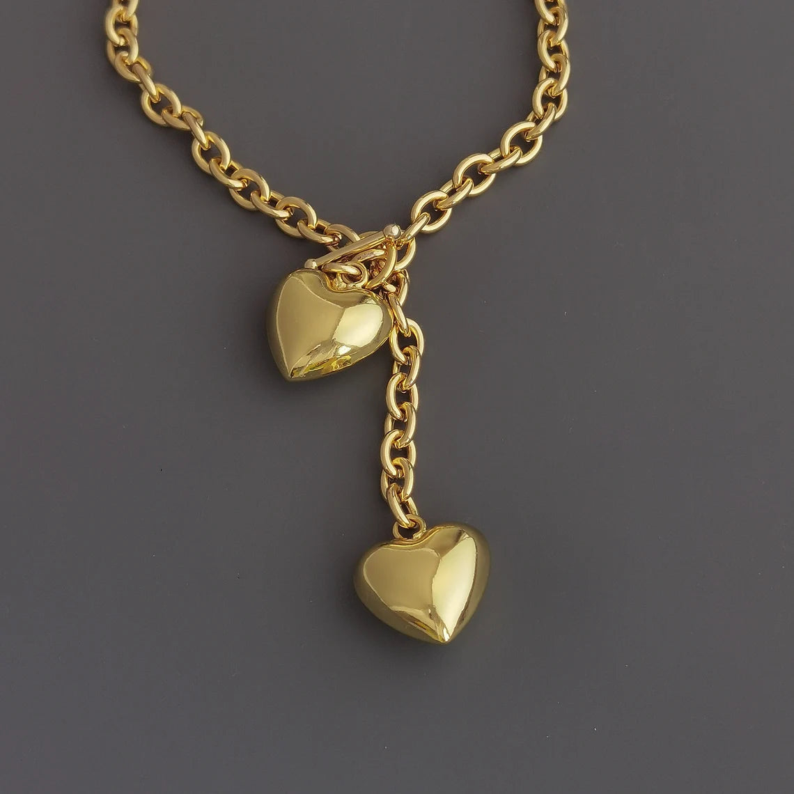 Elevate Your Style with a Gold-Tone Heart Pendant Necklace - A Symbol of Love and Elegance. #GoldHeartNecklace #PendantNecklace #LoveJewelry