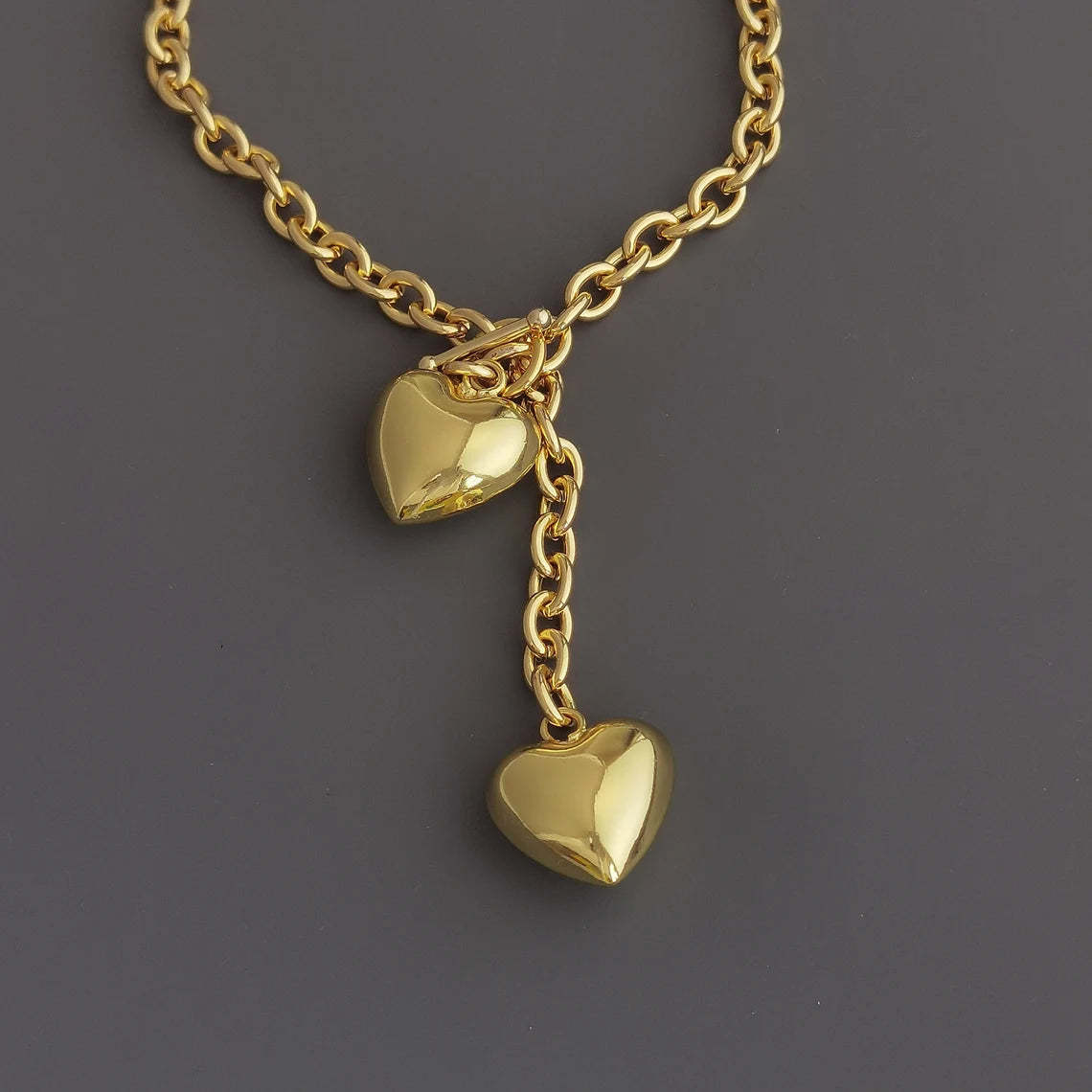 Elevate Your Style with a Gold-Tone Heart Pendant Necklace - A Symbol of Love and Elegance. #GoldHeartNecklace #PendantNecklace #LoveJewelry