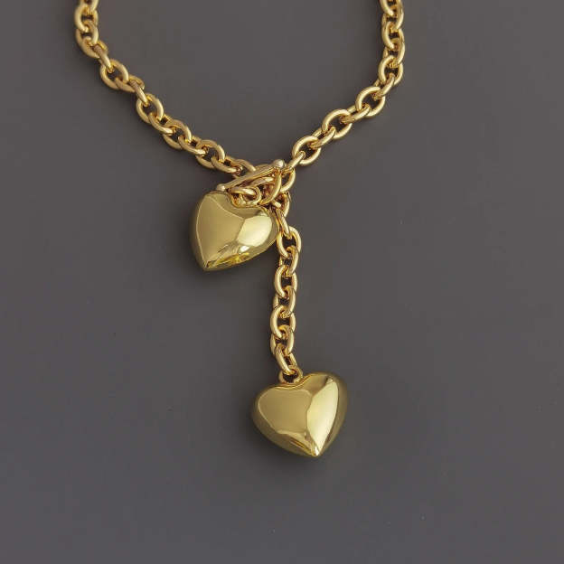 Elevate Your Style with a Gold-Tone Heart Pendant Necklace - A Symbol of Love and Elegance. #GoldHeartNecklace #PendantNecklace #LoveJewelry