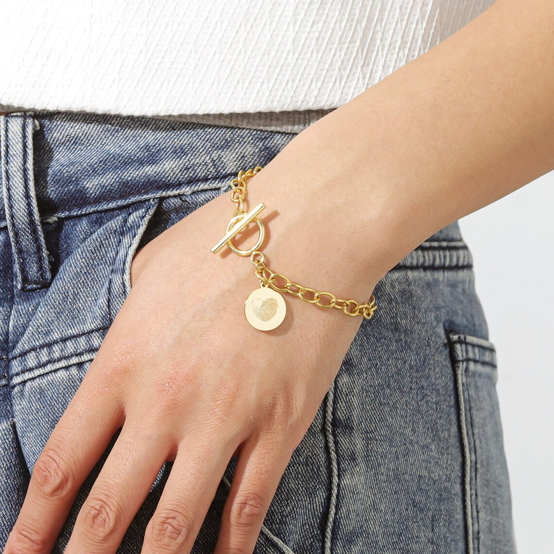 Cherish Life's Moments - Gold-Tone Fingerprint Bracelet, a Personal Touch. #FingerprintBracelet #GoldJewelry #PersonalizedGift