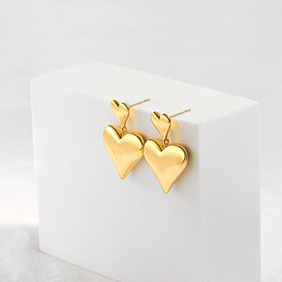 Elevate Your Style with 14k Gold Heart Earrings - Timeless Love Symbol. #14kGoldEarrings #HeartEarrings #ValentineGift