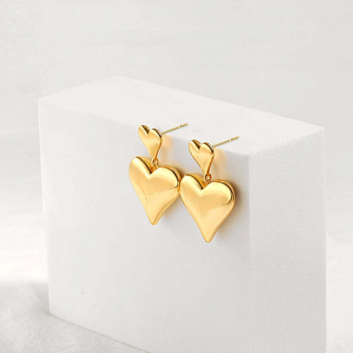Elevate Your Style with 14k Gold Heart Earrings - Timeless Love Symbol. #14kGoldEarrings #HeartEarrings #ValentineGift