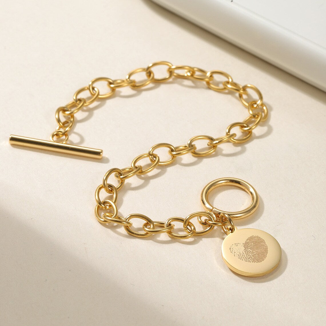 Cherish Life's Moments - Gold-Tone Fingerprint Bracelet, a Personal Touch. #FingerprintBracelet #GoldJewelry #PersonalizedGift