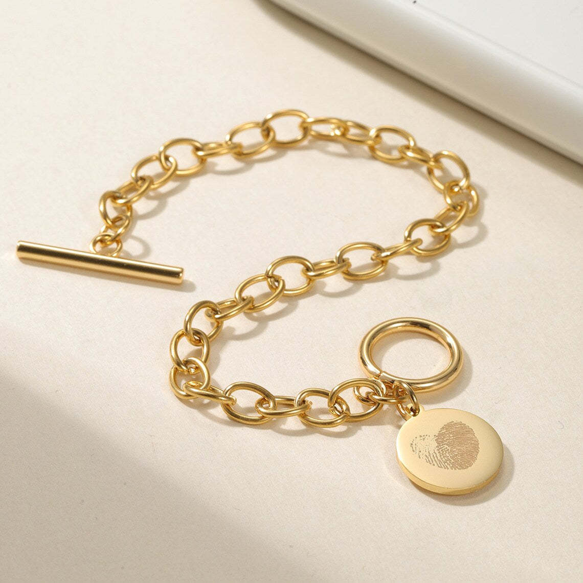 Cherish Life's Moments - Gold-Tone Fingerprint Bracelet, a Personal Touch. #FingerprintBracelet #GoldJewelry #PersonalizedGift