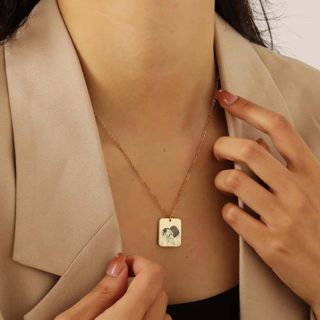 Wear Your Family Close to Your Heart - Custom Engraved Gold Family Portrait Necklace. #FamilyPortraitNecklace #GoldEngravedJewelry #CustomFamilyGift