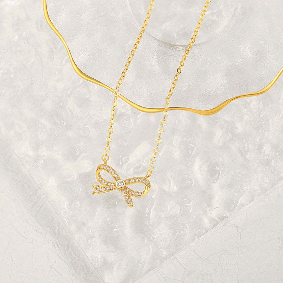 Elegant Gold Bow Pendant Necklace - Exquisitely Crafted in 14K and 18K Gold Plated & Solid