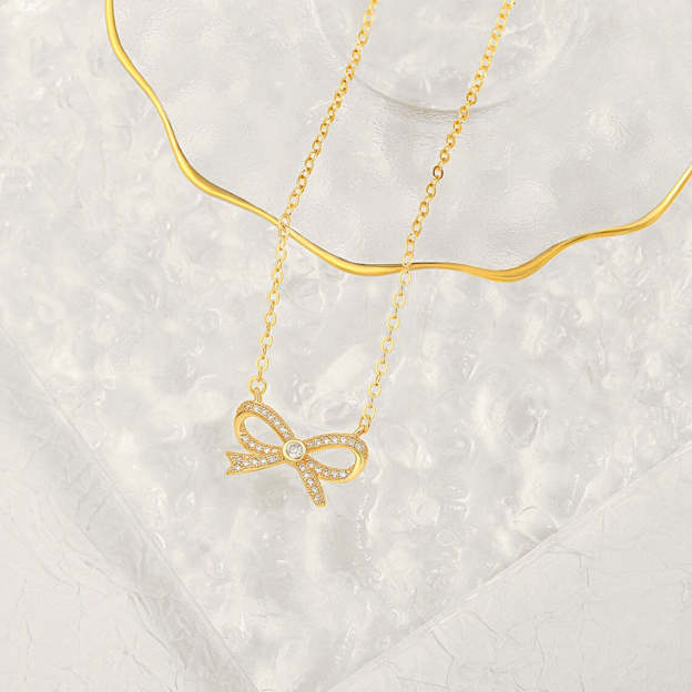 Elegant Gold Bow Pendant Necklace - Exquisitely Crafted in 14K and 18K Gold Plated & Solid
