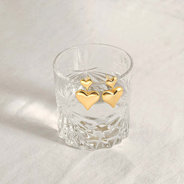 Elevate Your Style with 14k Gold Heart Earrings - Timeless Love Symbol. #14kGoldEarrings #HeartEarrings #ValentineGift