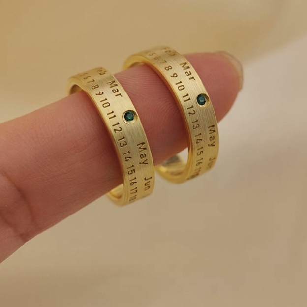 Silver anniversary rings with birthstone markings