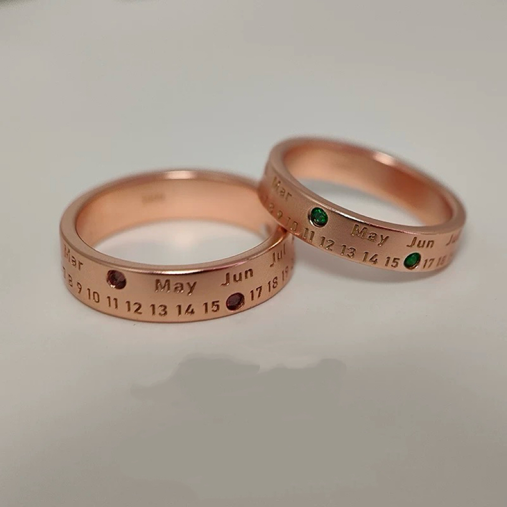 Silver anniversary rings with birthstone markings