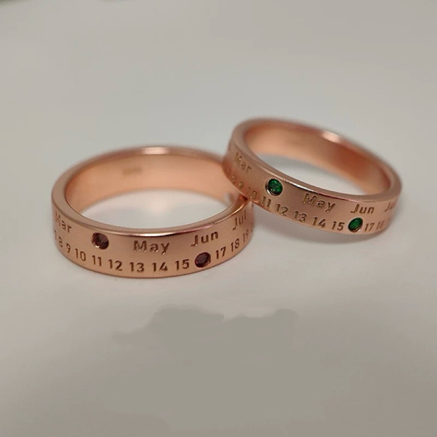 Silver anniversary rings with birthstone markings