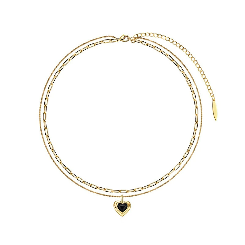 Gold-tone necklace with black heart pendant