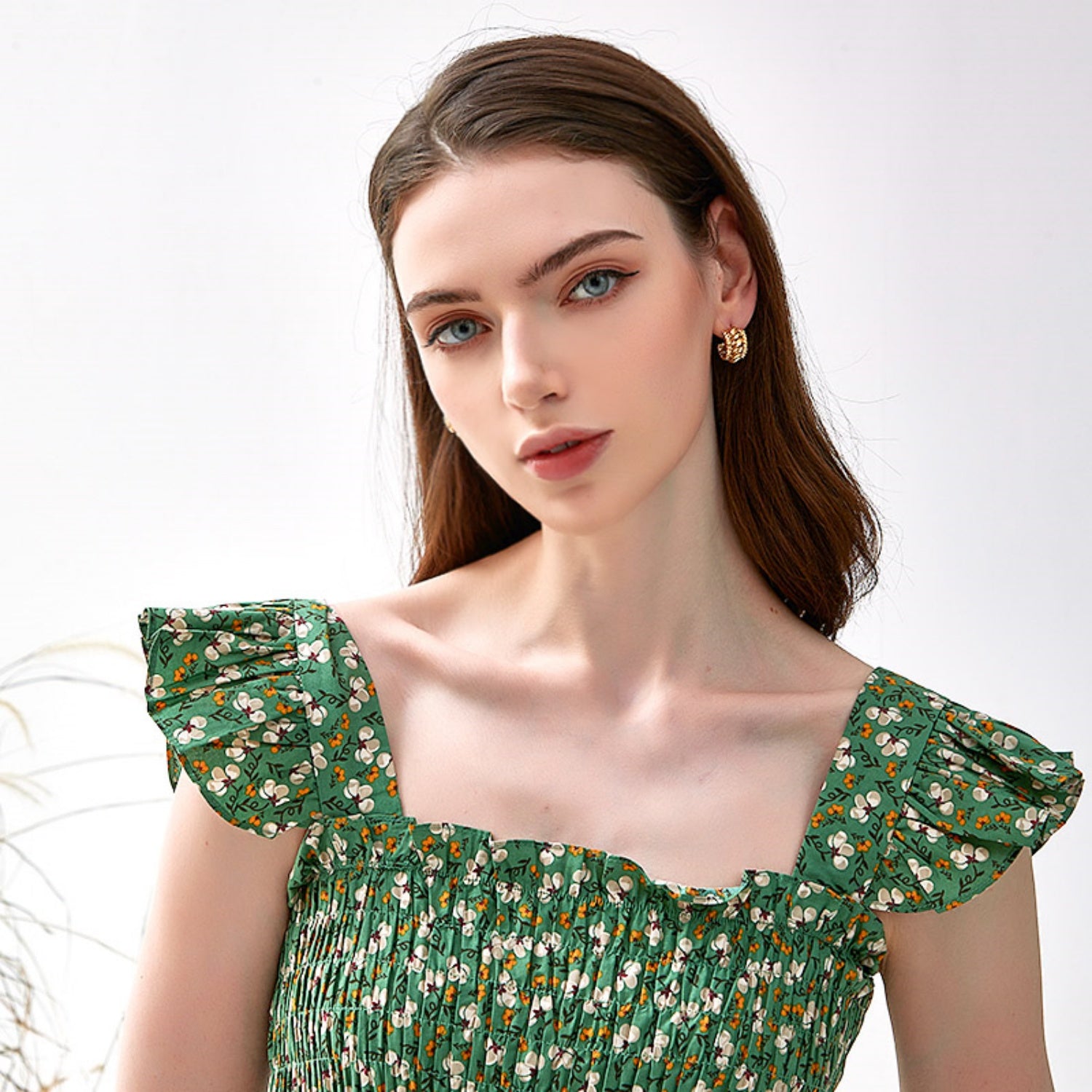 Gold Tone Braided Knot Stud Earrings