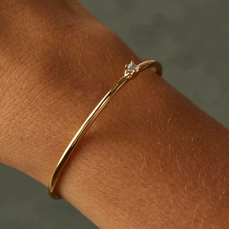 Gold-plated open solitaire bangle bracelet