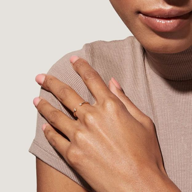 Gold-plated open end ring with two gemstones