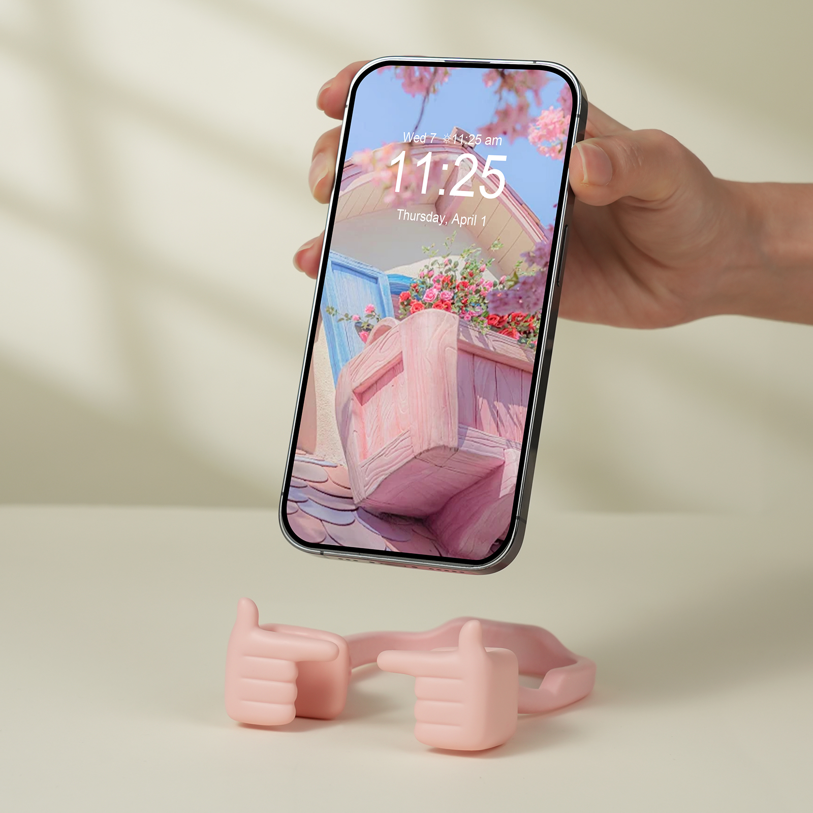 {"default":"pink Shy Pop expressive phone stand supporting a vertical smartphone, highlighting its cute and playful Vibe."}
