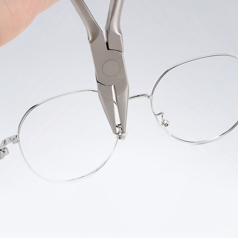 Reparaturzange zur Einstellung des Spiegelrahmens