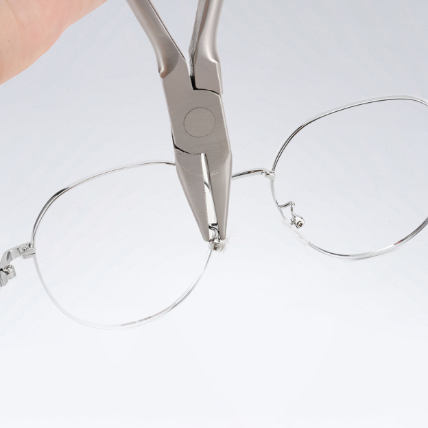 Reparaturzange zur Einstellung des Spiegelrahmens