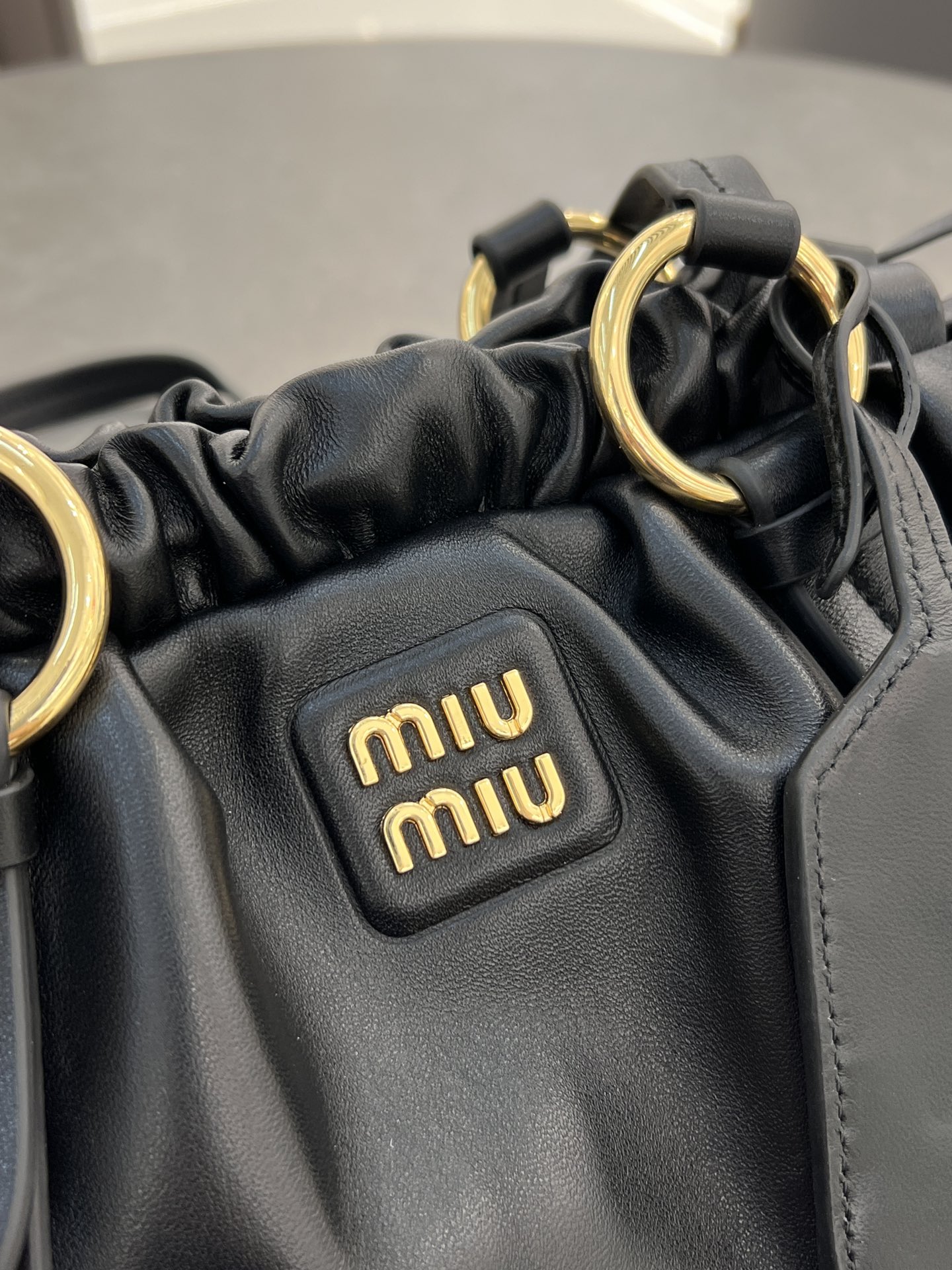 ]miumiu
