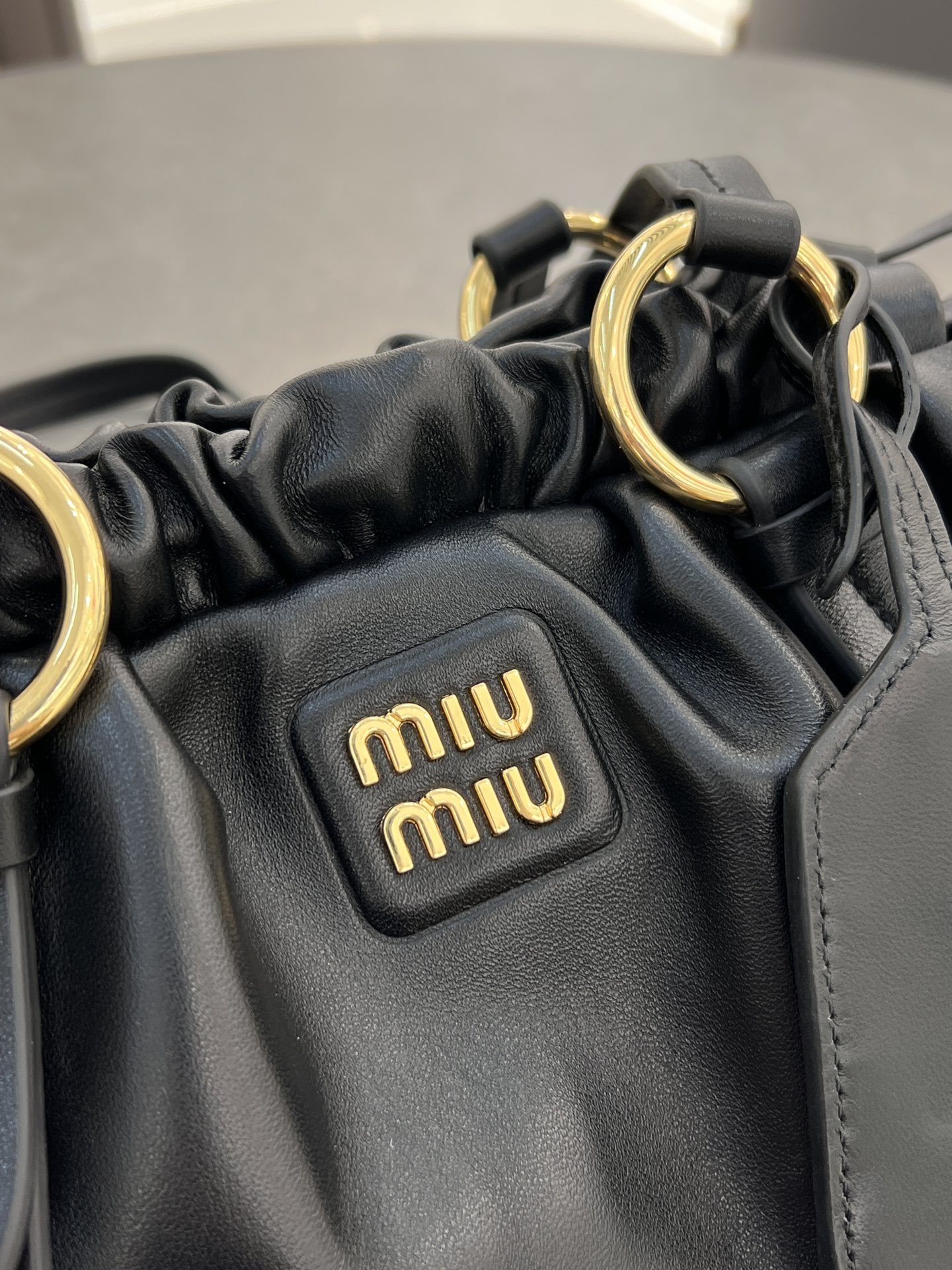 ]miumiu