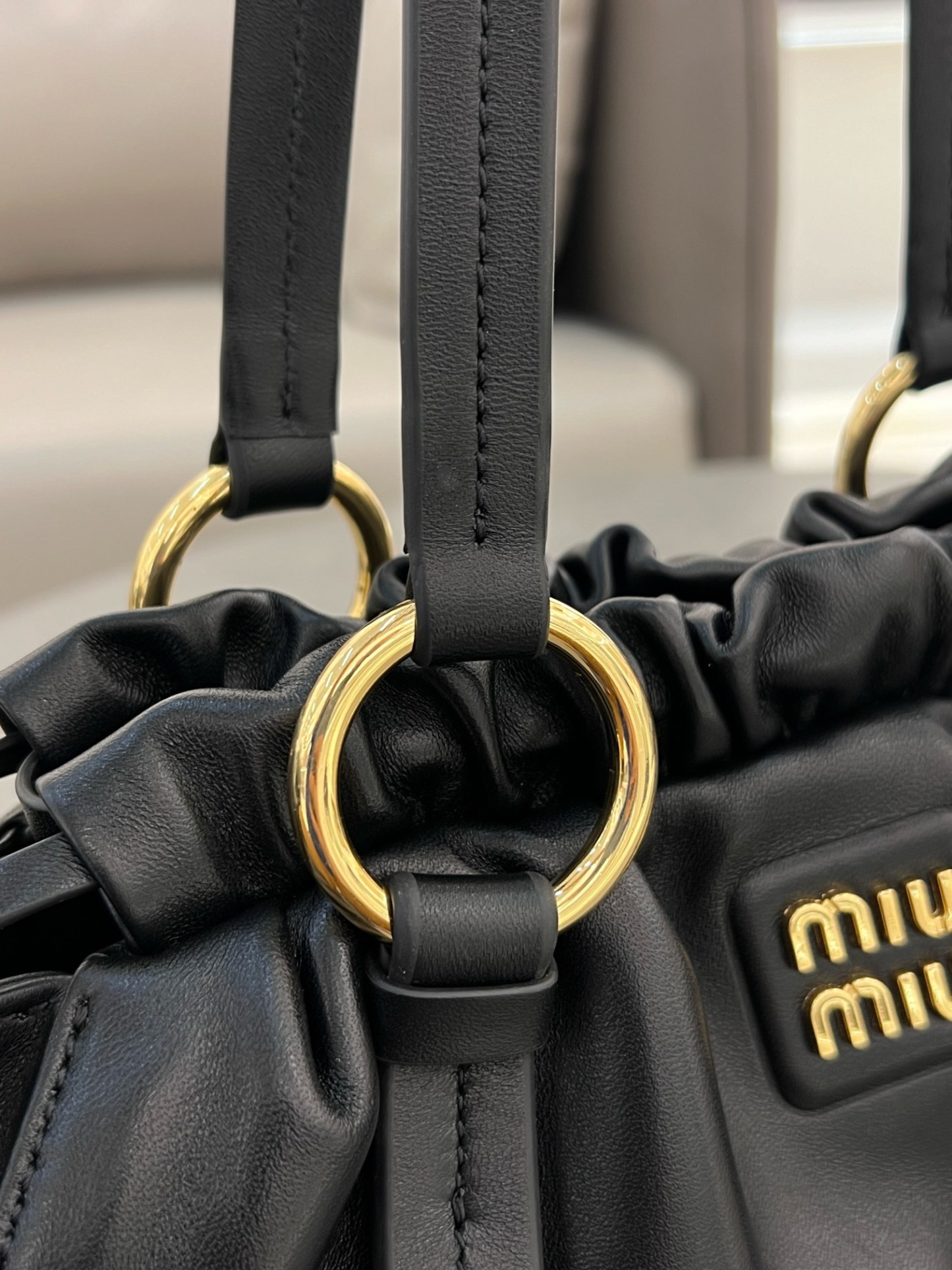 ]miumiu