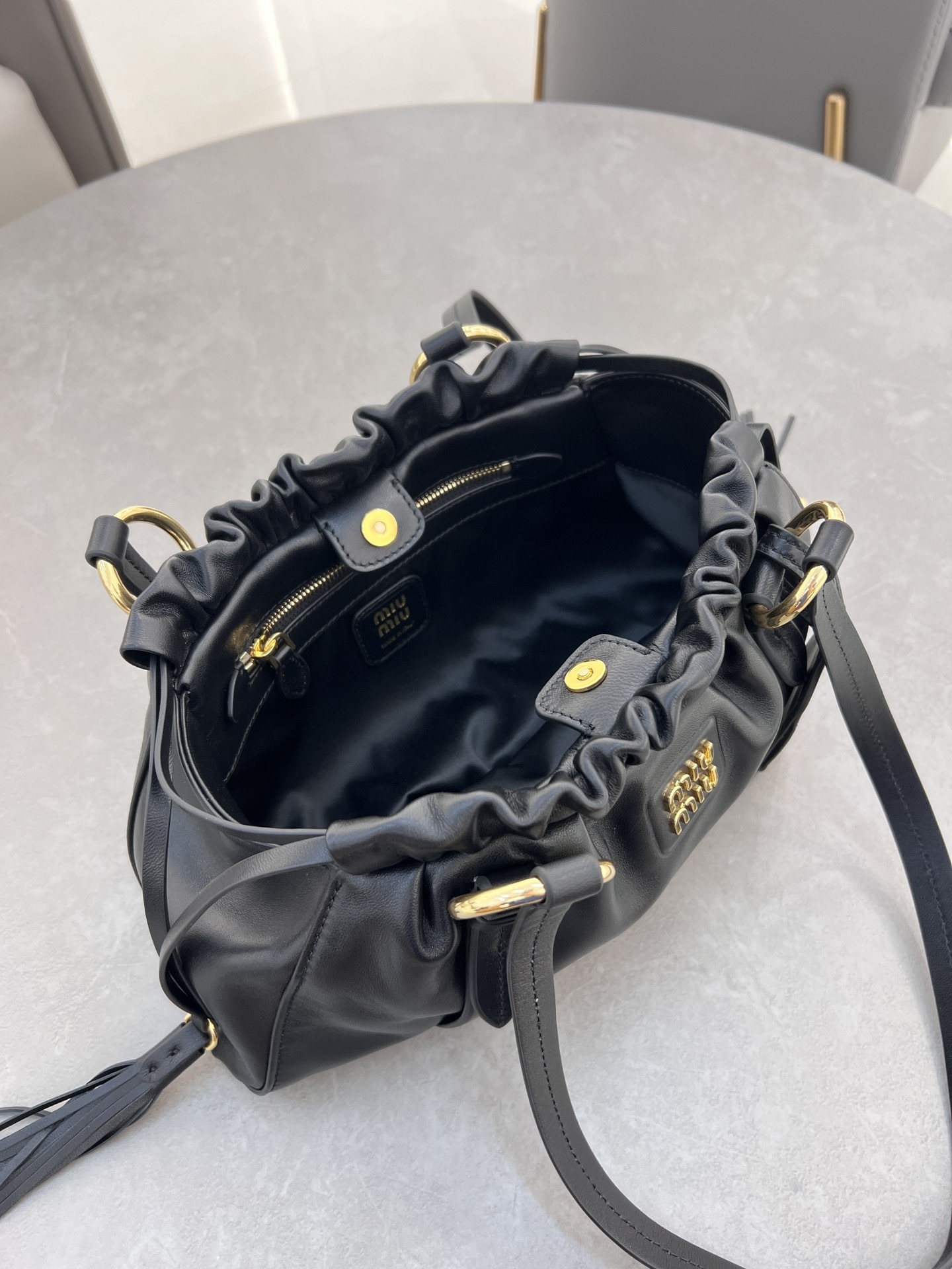 ]miumiu