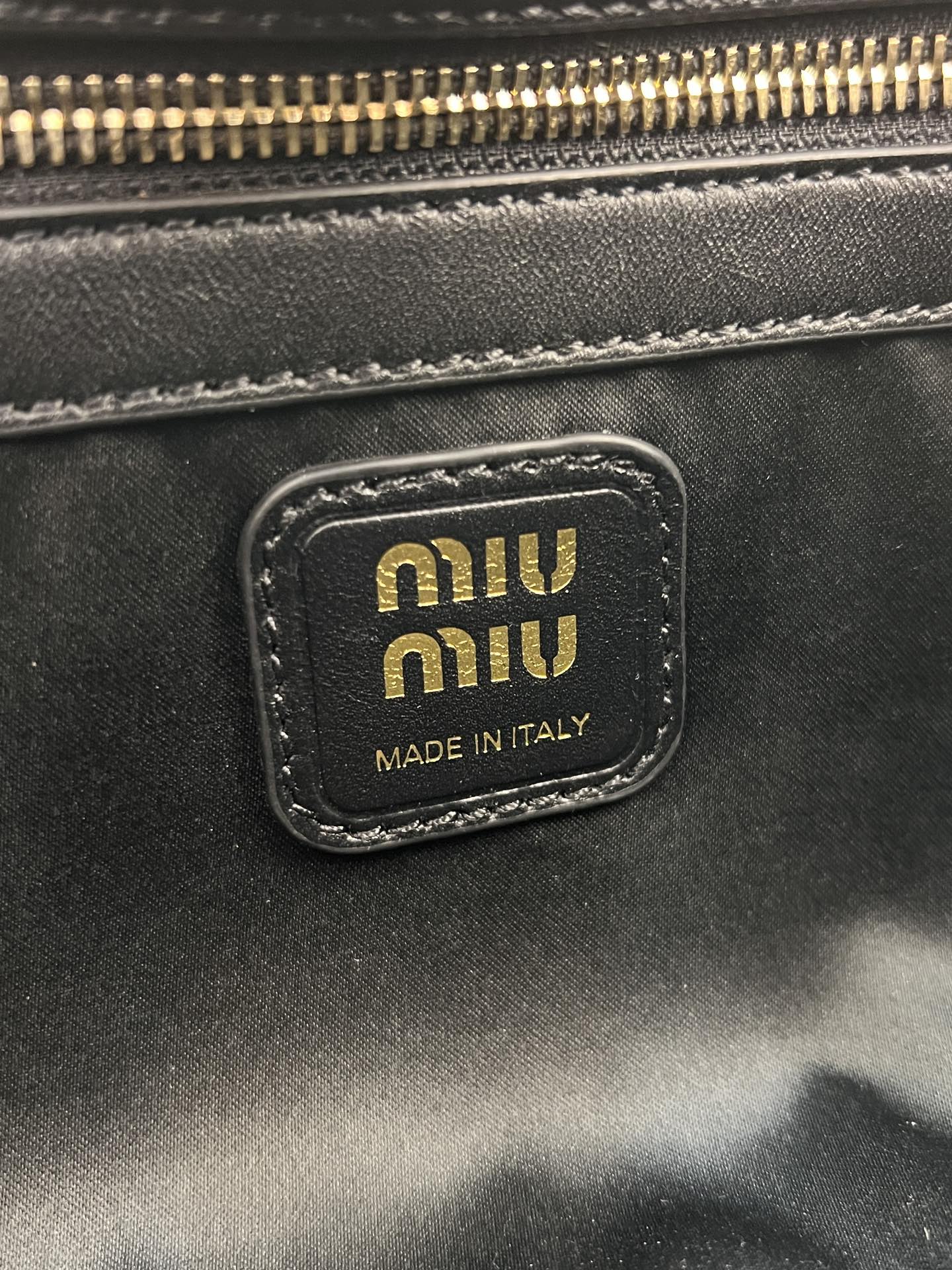 ]miumiu