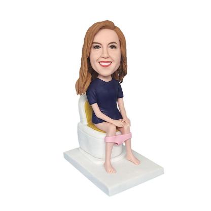 Woman Sitting On The Toilet Bobblehead