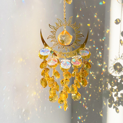 Crystal sun and moon pendant