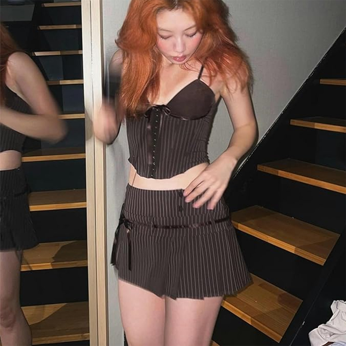 Gilet snellente a righe con bottoni alla moda francese