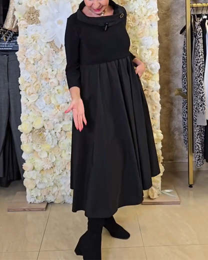 Abito lungo elegante e sofisticato con colletto alto e vita alta