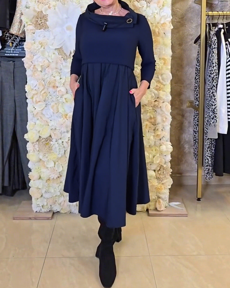 Abito lungo elegante e sofisticato con colletto alto e vita alta