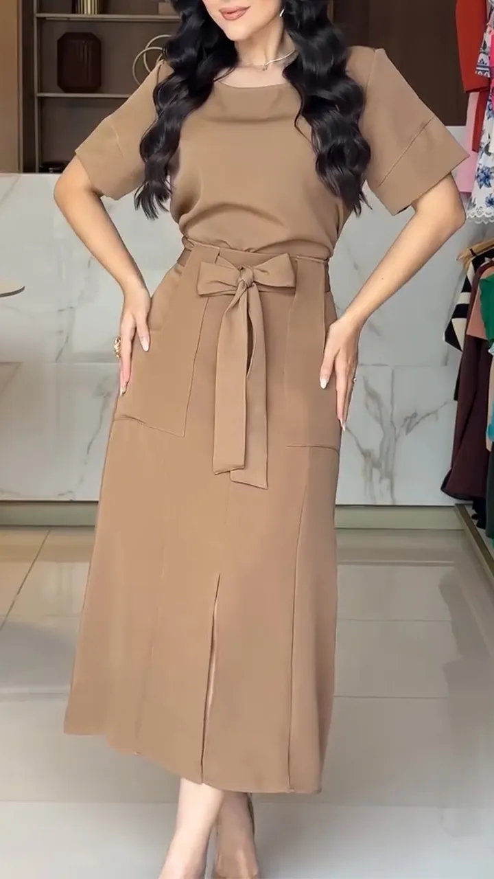 Abito lungo donna con scollo tondo e fiocco elegante