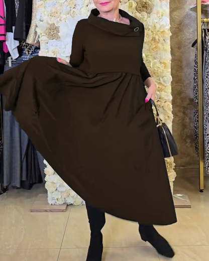 Abito lungo elegante e sofisticato con colletto alto e vita alta