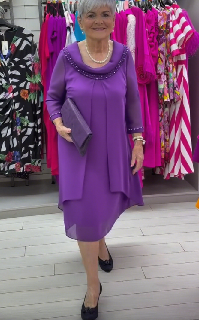 Abito elegante con perle e strass